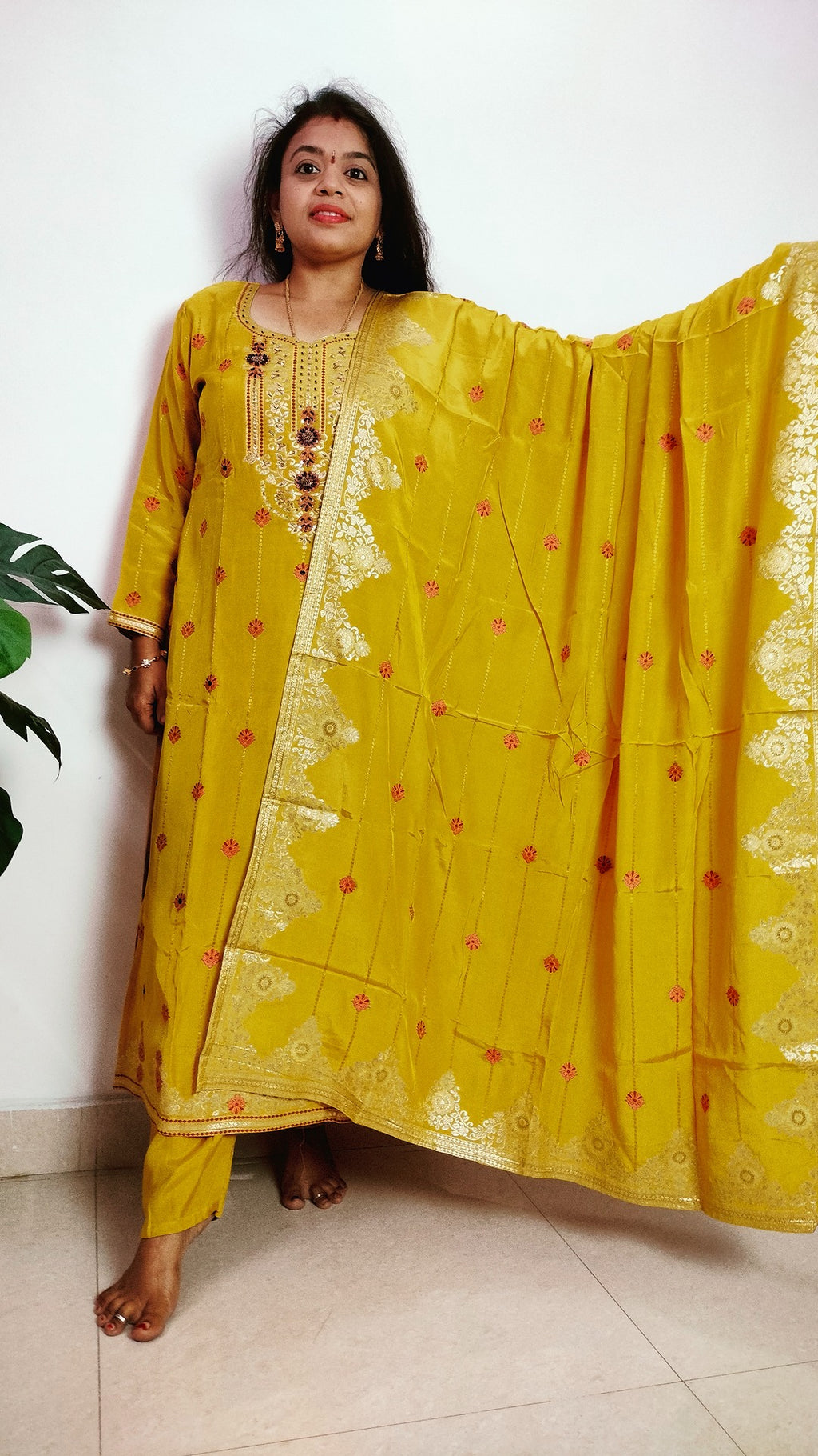 Mustard yellow jaquard crepe straight fit kurti set.