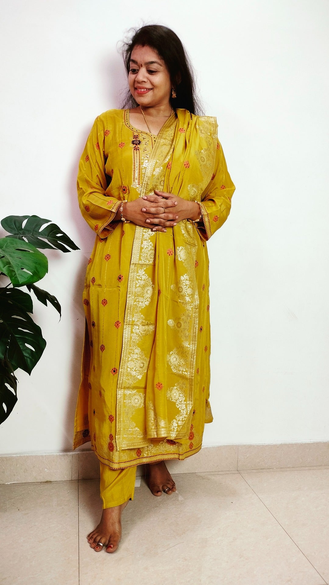 Mustard yellow jaquard crepe straight fit kurti set.