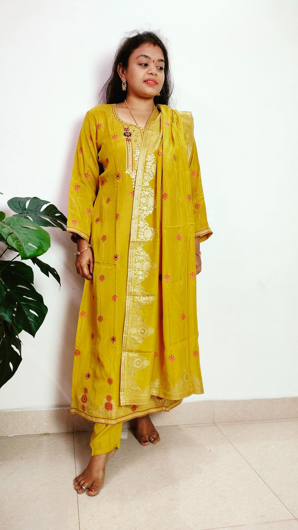 Mustard yellow jaquard crepe straight fit kurti set.