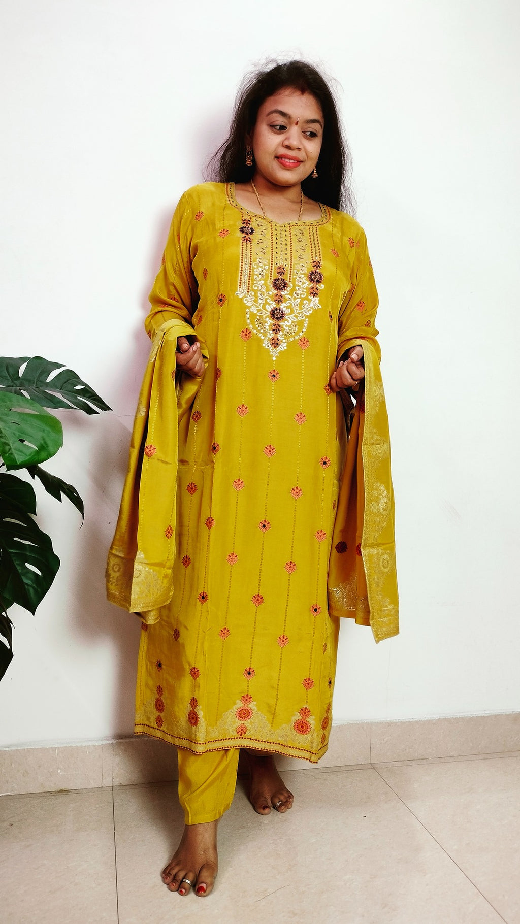 Mustard yellow jaquard crepe straight fit kurti set.