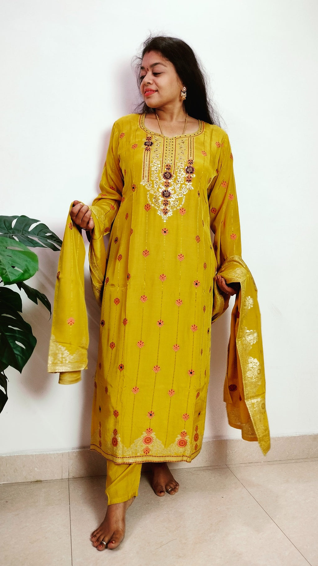 Mustard yellow jaquard crepe straight fit kurti set.